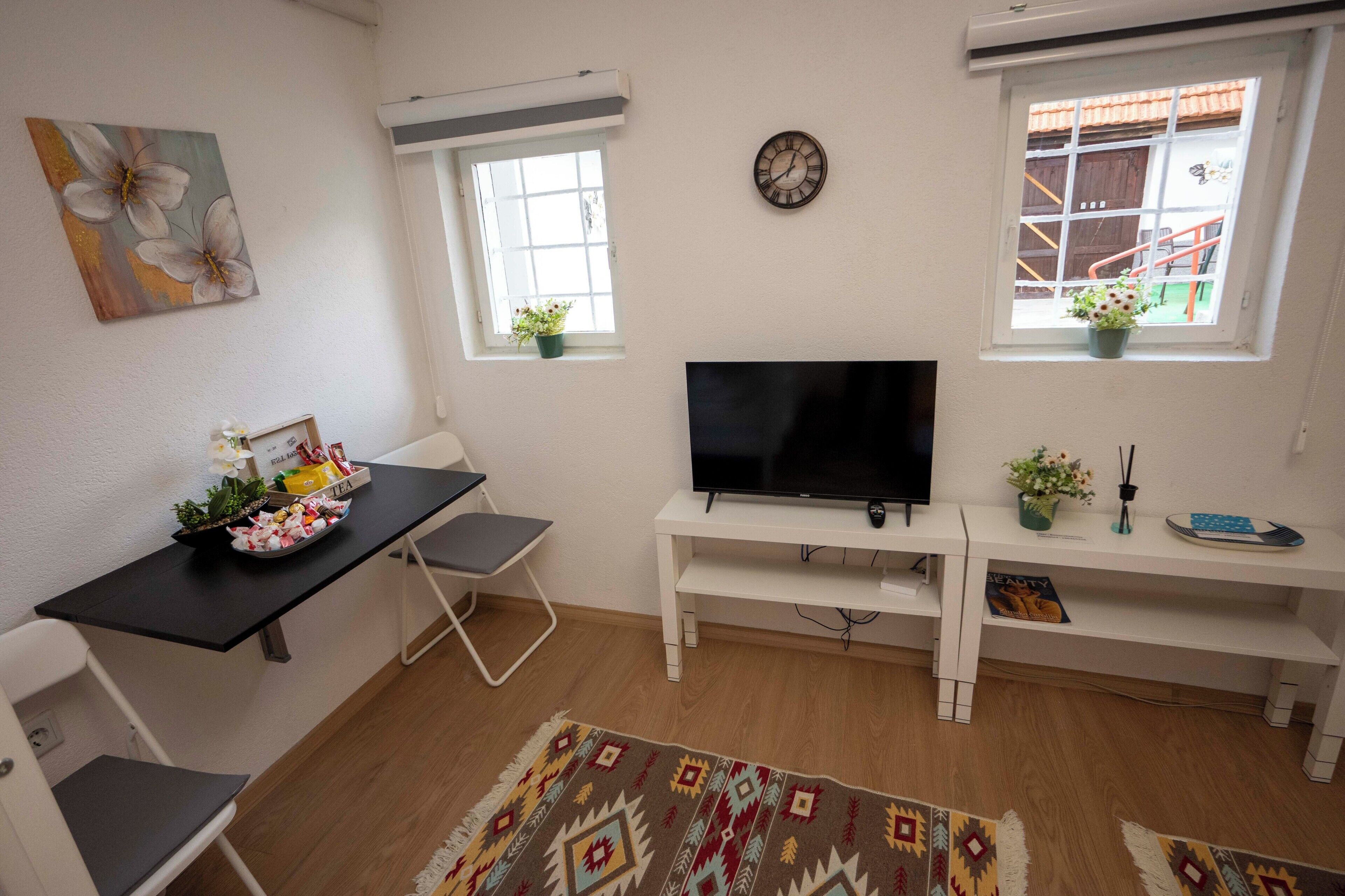 Căn hộ dành cho gia đình, nhiều giường, sân hiên, quang cảnh sân vườn | Nội thất