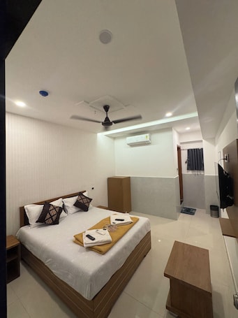In-room safe, desk, laptop workspace, free WiFi. Hotel Kalp Rooms