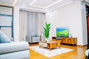 Living area - Serene 2-bedroom apartment with AC in vibrant Dar es Salaam (Dar es Salaam)