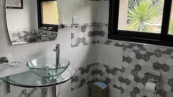 Deluxe Apartment, Balcony, Lake View | Bathroom | Shower, slippers, towels, soap