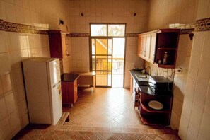Departamento Deluxe, balcón, vista al lago | Cocina privada