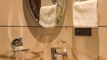 Shower, towels, soap, shampoo