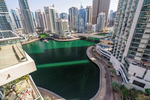 A high-rise building with a view of a body of water and other high-rise buildings. - Free Housekeeping Visits During Your Stay - Stayshort - Fancy 1-bedroom Apartment Sleeps 4 in Dubai Marina (Dubai)