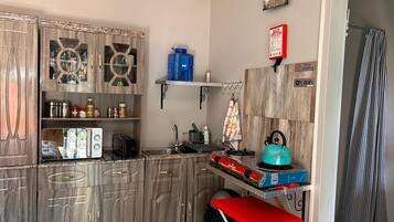 Basic Double Room, Garden View | Private kitchen | Fridge, microwave, stovetop, electric kettle