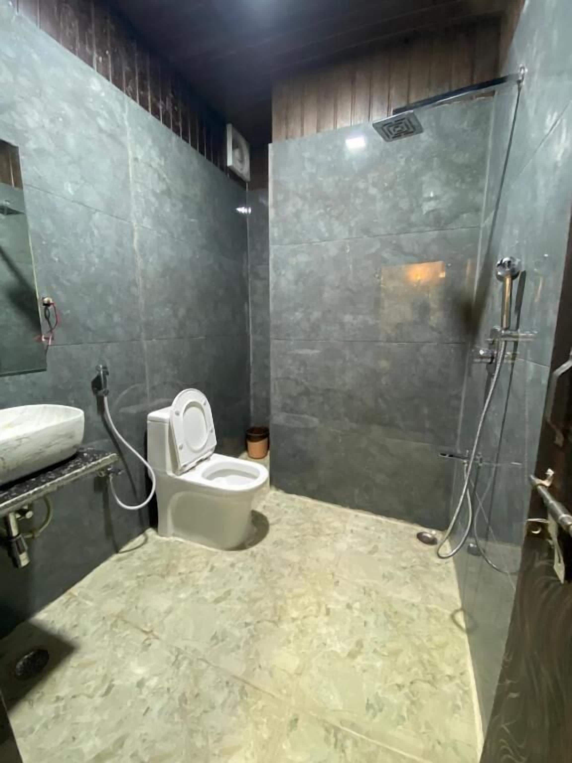 Family Room, Balcony, Mountain View | Bathroom | Free toiletries, slippers, towels, soap