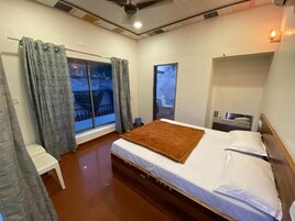 In-room safe, laptop workspace, blackout drapes, soundproofing