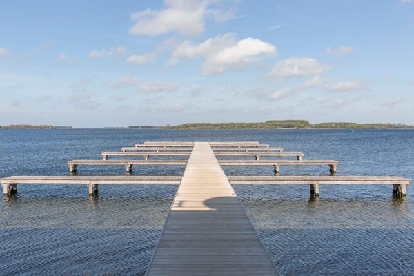 Stroll the long pier and breathe in lake serenity.