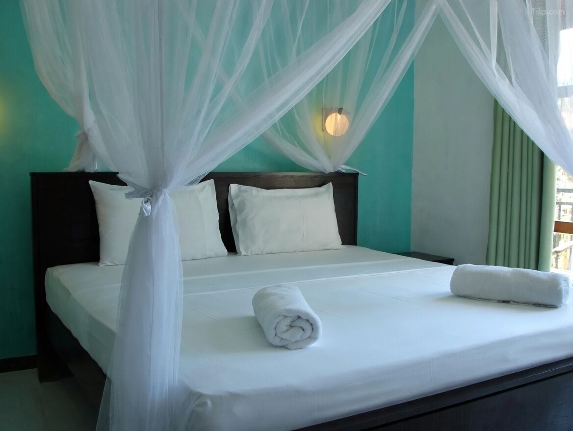 Deluxe Room, Balcony, Pool View | Iron/ironing board, free WiFi