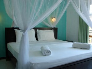 Deluxe Room, Balcony, Pool View | Iron/ironing board, free WiFi
