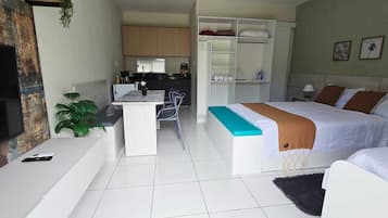 Quarto família, vista para o jardim