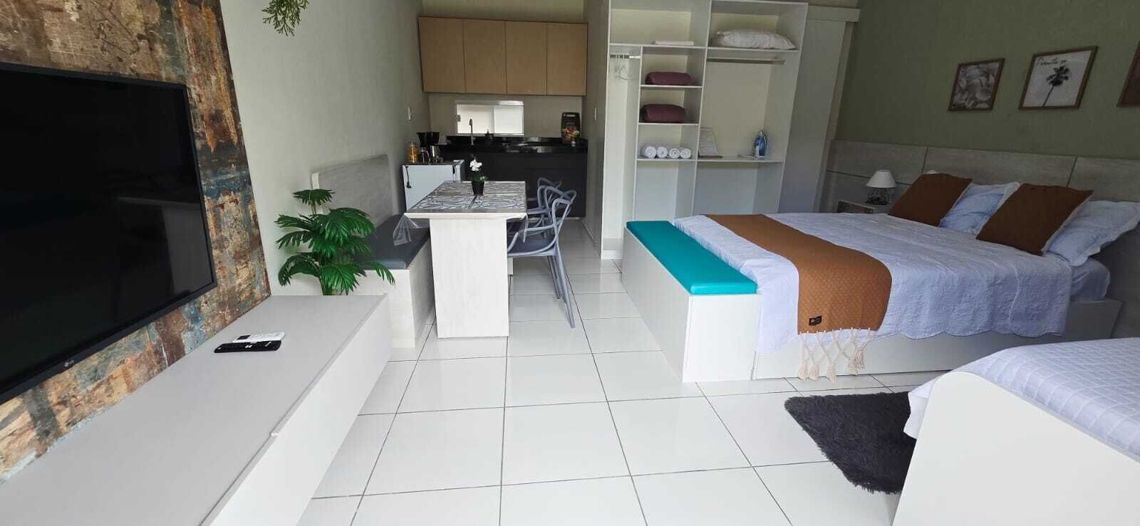 Quarto família, vista para o jardim