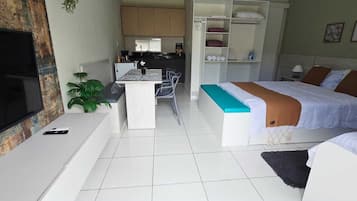 Quarto família, vista para o jardim