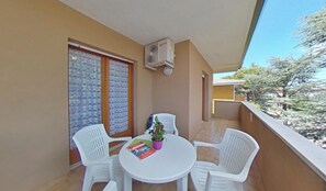 Apartment, 1 Bedroom, Terrace | Balcony - Simplicity and Comfort in Lignano (Lignano Sabbiadoro)