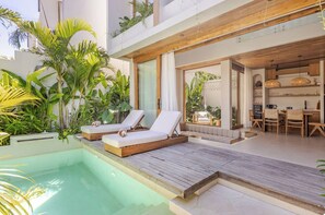 Villa Deluxe - utsikt mot poolen | Terrass/Patio