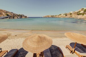 Sun loungers, beach umbrellas, beach towels, beach bar