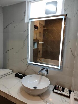 Luxury Studio Suite, Balcony, City View | Bathroom | Slippers - The Solace (New Delhi)