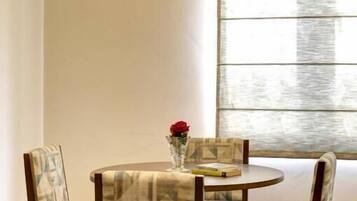 Family Twin Room, City View | Dining