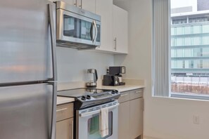 Fridge, microwave, oven, stovetop - Luxury Apt | Terrace with Grills & Lounge (Cambridge, MA)