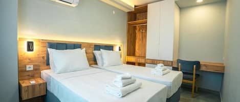 2+1 Deluxe Apartment, City View | In-room safe, desk, laptop workspace, soundproofing