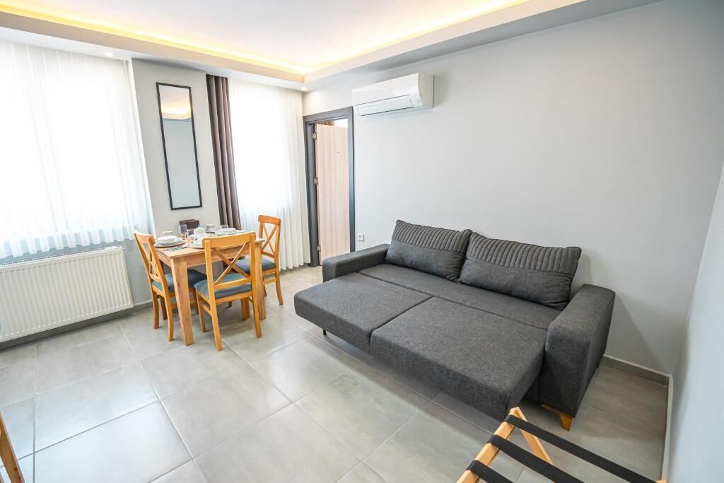 Apartamento Deluxe, vistas a la ciudad | Zona de estar