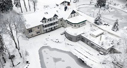 Appartement Ă l'hĂŽtel « Pensionszimmer 24 mÂČ avec balcon » : jardin partagĂ©, balcon et Wi-Fi