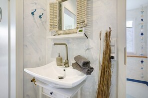 Douche, serviettes fournies