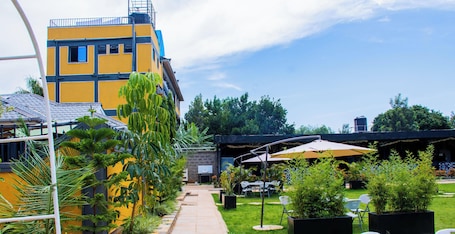 Outdoor dining. The Grand Brystal Hotel