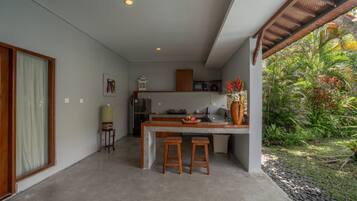 One Bedroom Rose | Private kitchen | Fridge, microwave, stovetop, coffee/tea maker