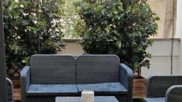 Family Studio Suite, Garden View | Property grounds