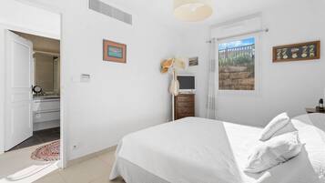 1 chambre, fer et planche Ă repasser, draps fournis