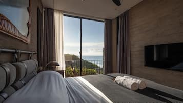 Suite Deluxe, balcon, vue océan | Literie de qualité supérieure, matelas Select Comfort, minibar