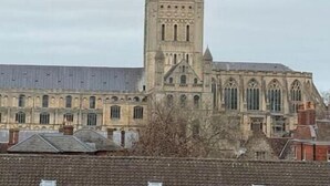 A large, historic building with a tall, pointed tower and a symmetrical facade. - Apartment 1
Modern, Cozy Apartment in a Prime Central Location (Norwich)