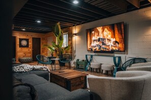 Smart TV, fireplace, books