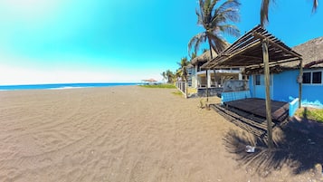 Cabaña panorámica, aire acondicionado, frente al mar | Wifi gratis y ropa de cama