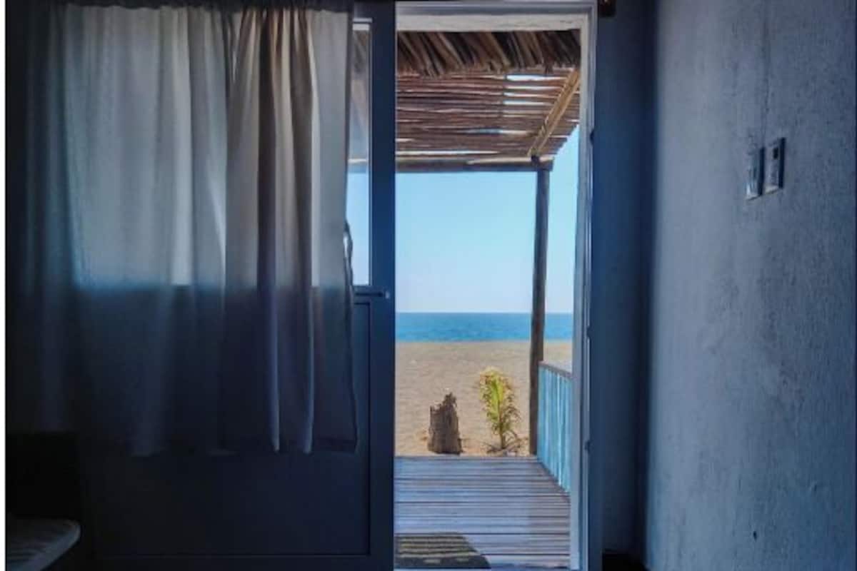 Panoramic Double Room, Air conditioning, Beach View | Free WiFi, bed sheets