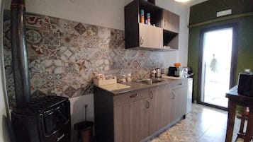 Fridge, microwave, electric kettle, toaster