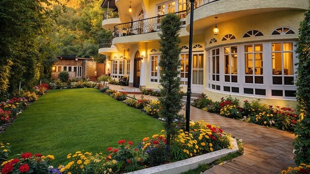 A multi-story hotel with balconies, a well-maintained garden, and a mountainous backdrop. - Heritage Rose Inn - Dal Lake (Srinagar)