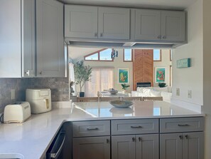 Fridge, microwave, oven, stovetop - Odyssey at Collington Harbour – Waterfront with Dock + Boat Lift • 5BR (Kill Devil Hills)