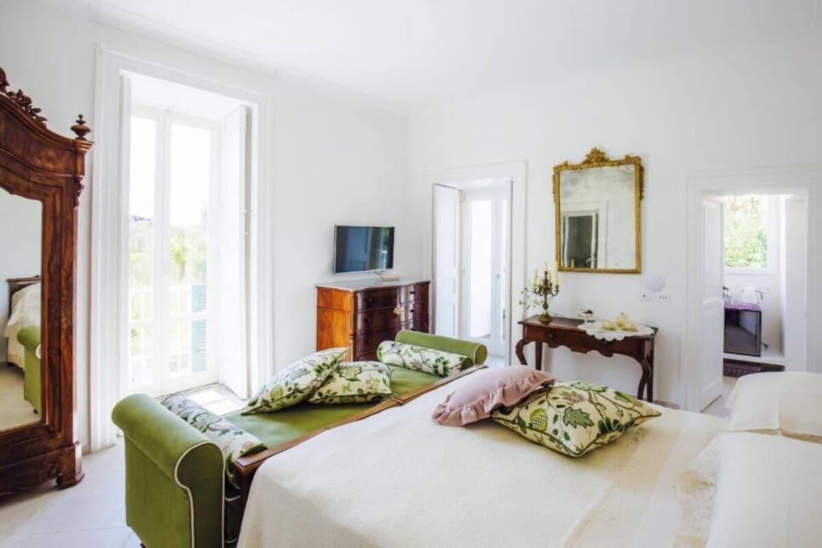 Habitación triple superior, balcón, vista al jardín