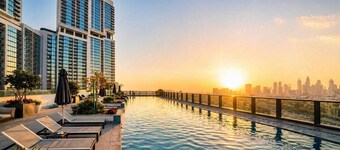 Luxury 1BR at The Crest-Sobha with Dubai Skyline Views & Personalized Hosting