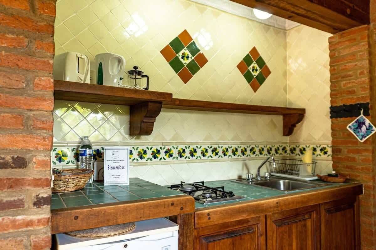 Fridge, stovetop, cookware/dishes/utensils, dining tables