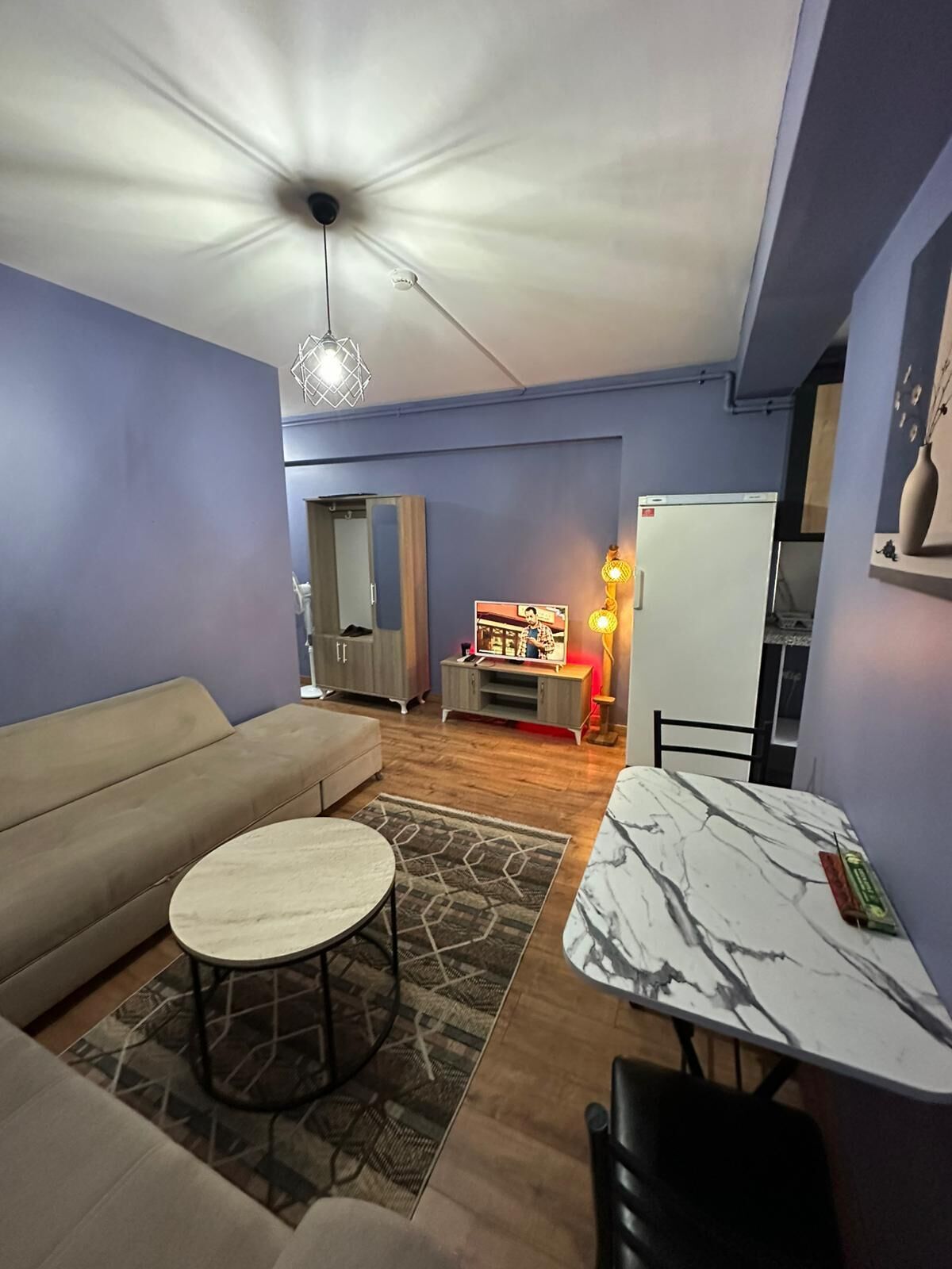 Family Apartment | Living area | 42-inch Smart TV with satellite channels