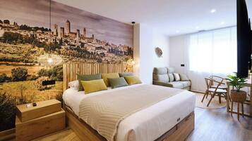 1 dormitorio, tabla de planchar con plancha, wifi y ropa de cama