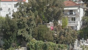 A residential area with multiple buildings, trees, and a clear sky. - Comfort Kostrena Apartments Rijeka (Kostrena)