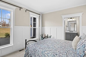 Queen Bedroom - The main-floor queen bedroom, easy for those who prefer to skip the stairs. - Fairview Lake Haven | New Waterfront Home | Private Side | 6BR/4BA | Boathouse & Dock (Mineral)