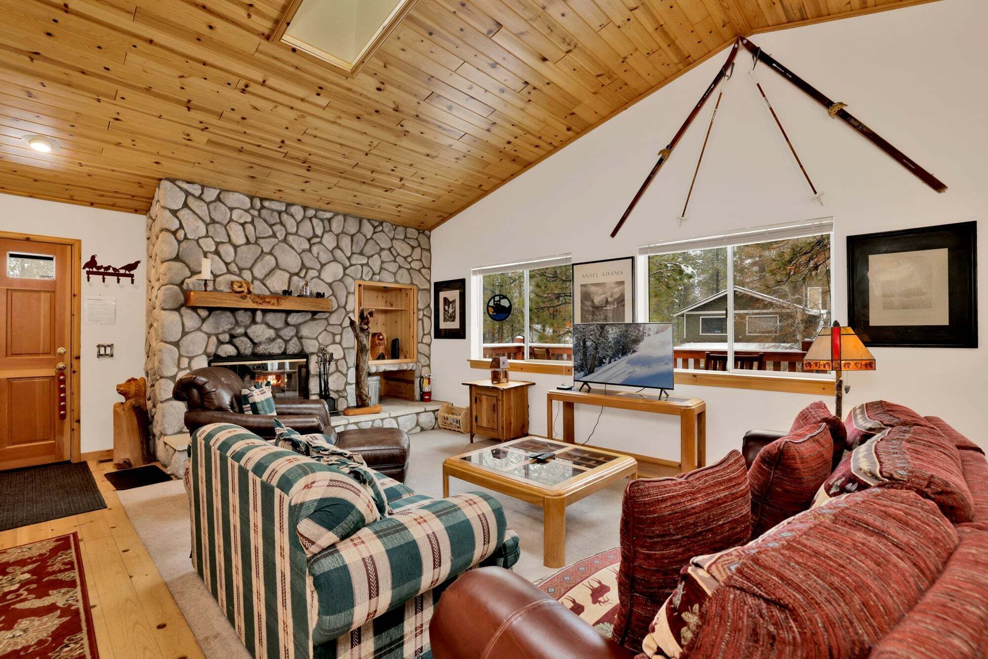 Cabana, várias camas | Área de estar