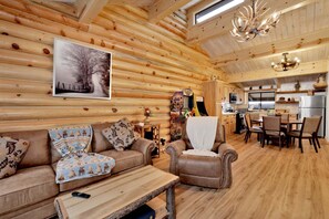 A log cabin interior with a living room, dining area, and kitchen. - 2586-ours De Ski Chateau (Big Bear Lake)