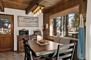 A wooden interior with a sign reading 'Welcome to our LAKE HOUSE BIG BEAR LAKE - CALIFORNIA EST. 2025.' - 2594-willow Bear Lodge (Big Bear Lake)