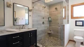 Shower, towels, soap, toilet paper