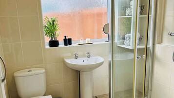 Shower, hair dryer, shampoo